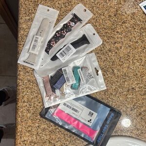 Apple Watch Bands in Black, Pink, Blue, and White